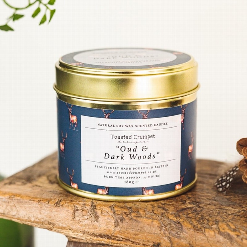 TOASTED CRUMPET STAG DARK WOODS & OUD CANDLE IN A GOLD TIN